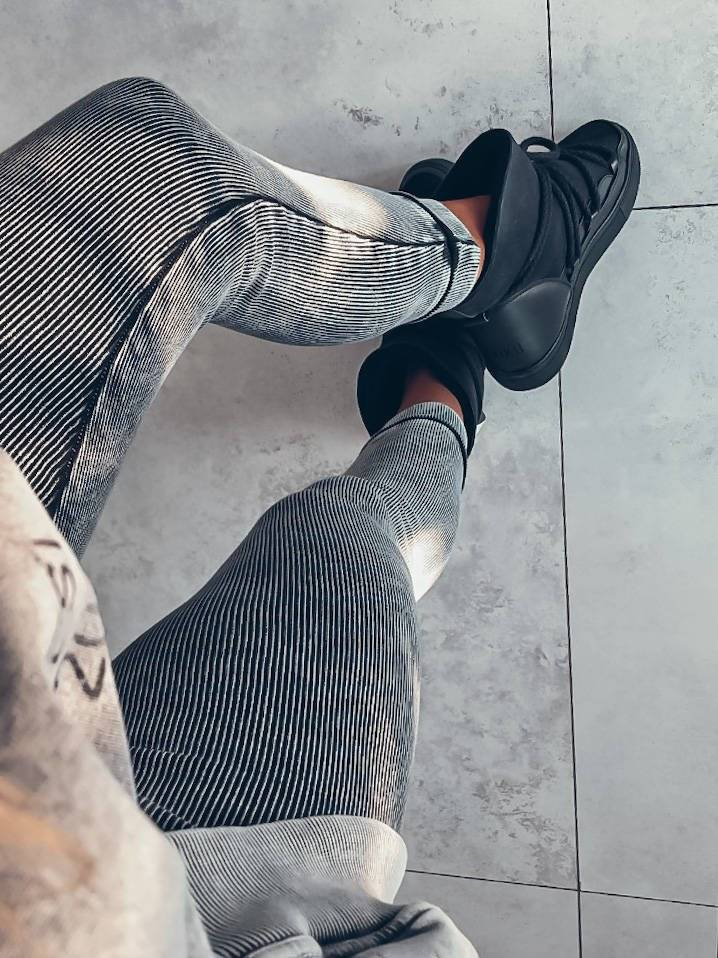 Gray space leggings with a faded effect
