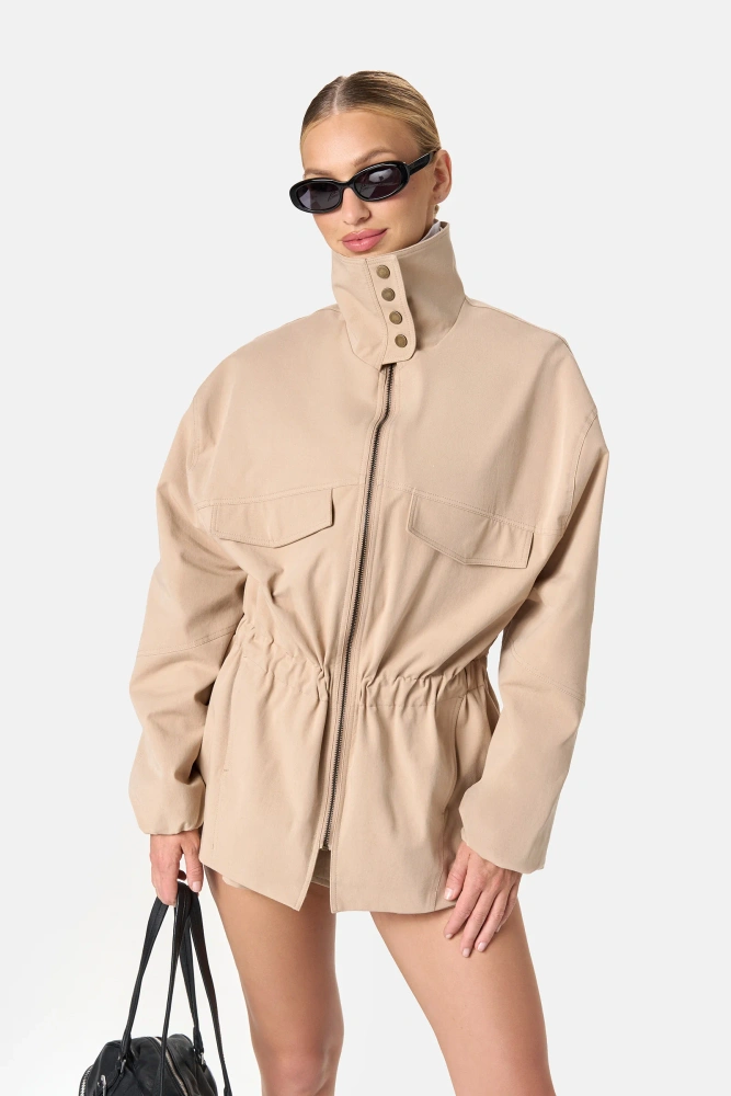 Sheila – Women’s beige longline jacket “Shelter”